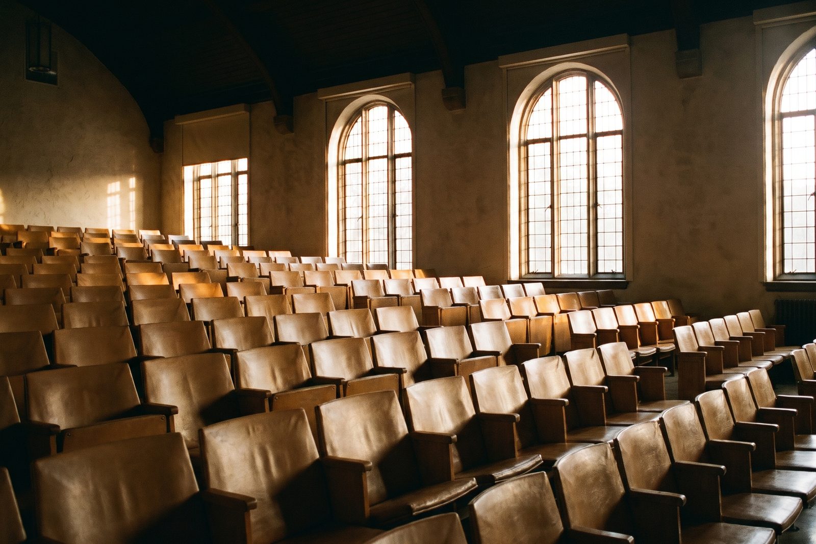 An empty lecture hall in morning light